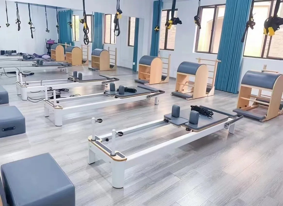 How to Choose the Right Pilates Reformer Material: Wood vs. Metal