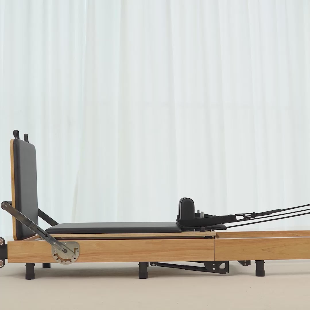 Load video: BR Oak Foldable Pilates Reformer – Studio-Level Foldable Reformer